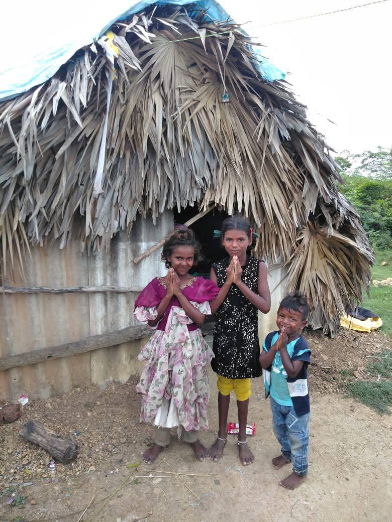 Children greeting volunteers